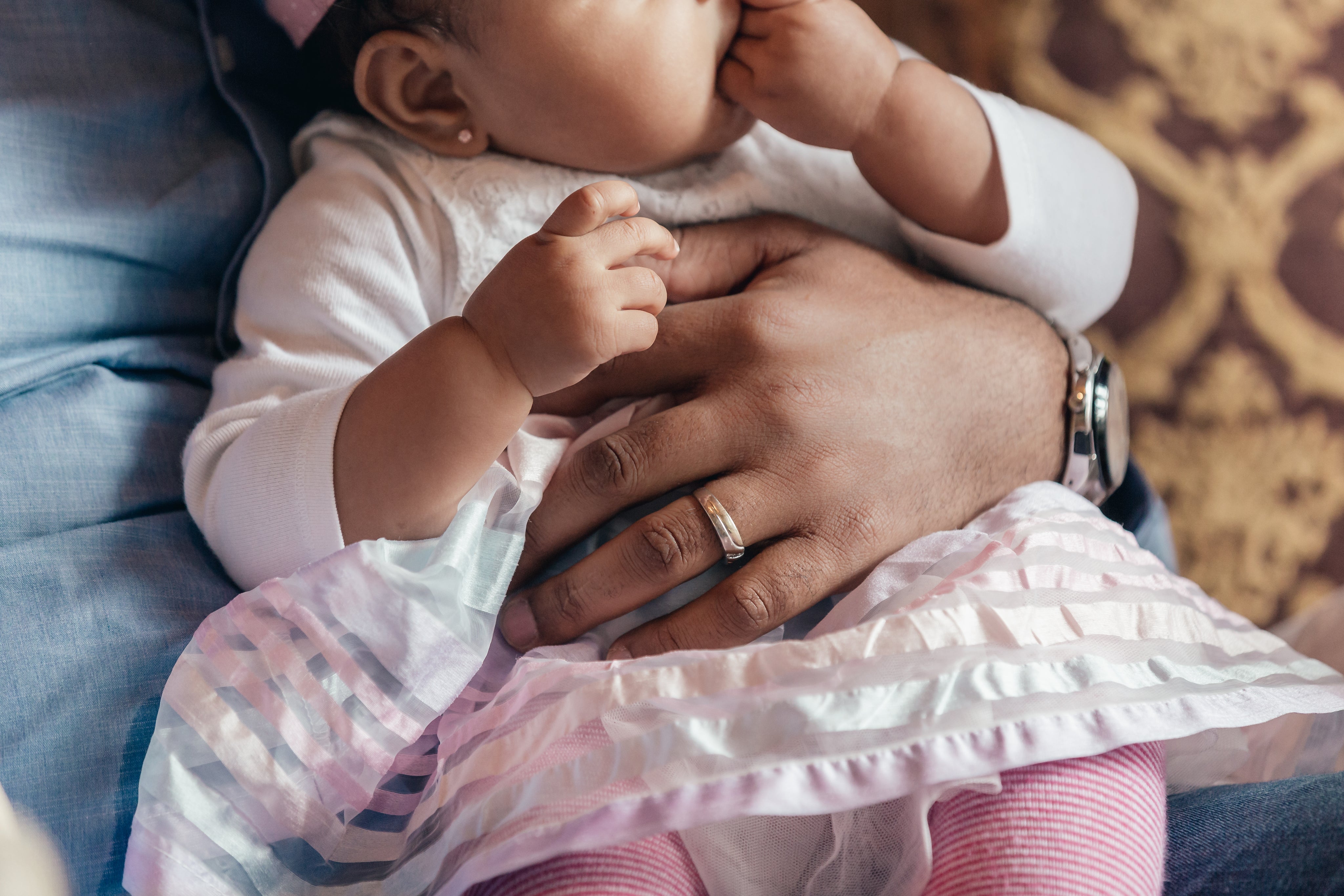 files/father-holding-baby-daughter-in-lap.jpg